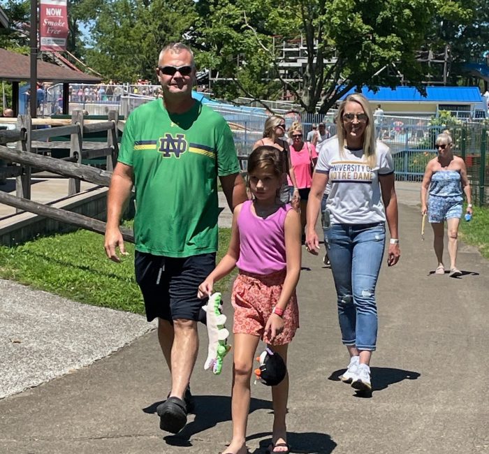Bauer employees with child at a company outing