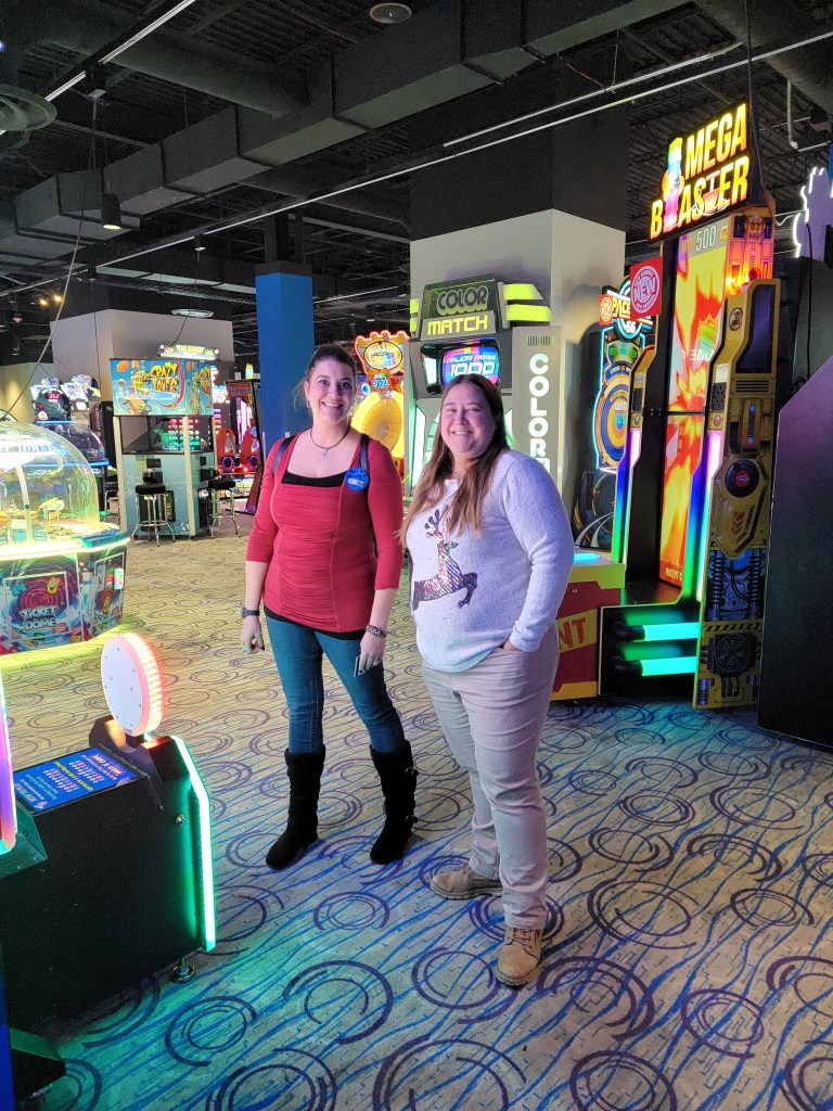 Bauer employees at the arcade chatting