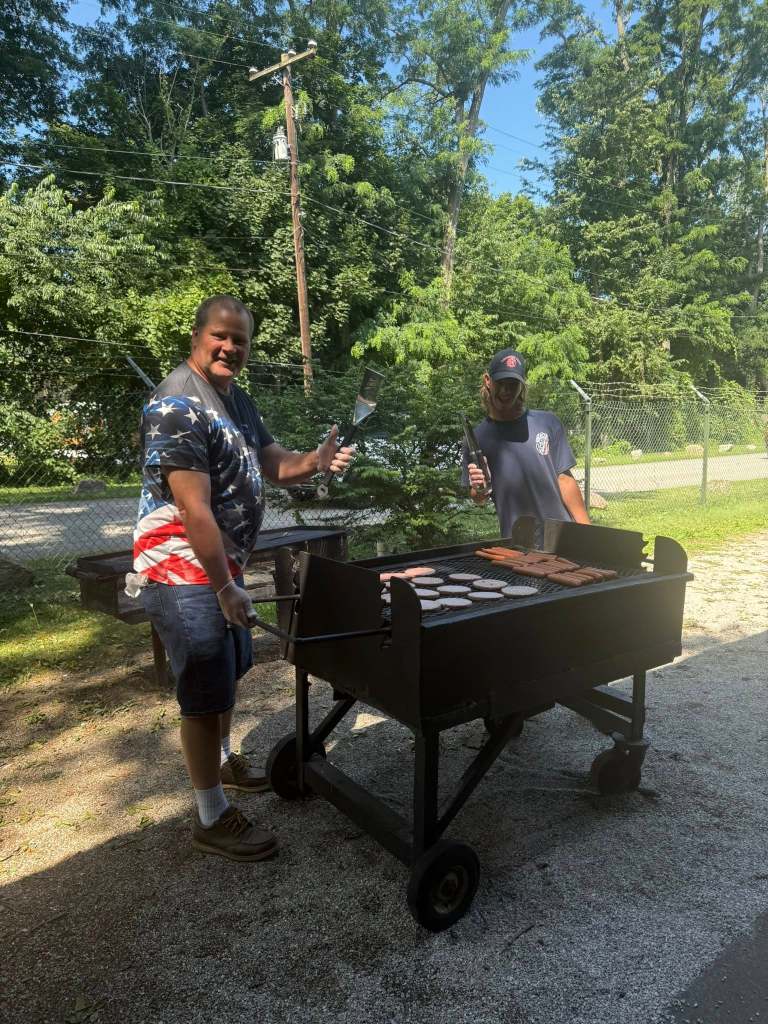 Bauer employees grilling