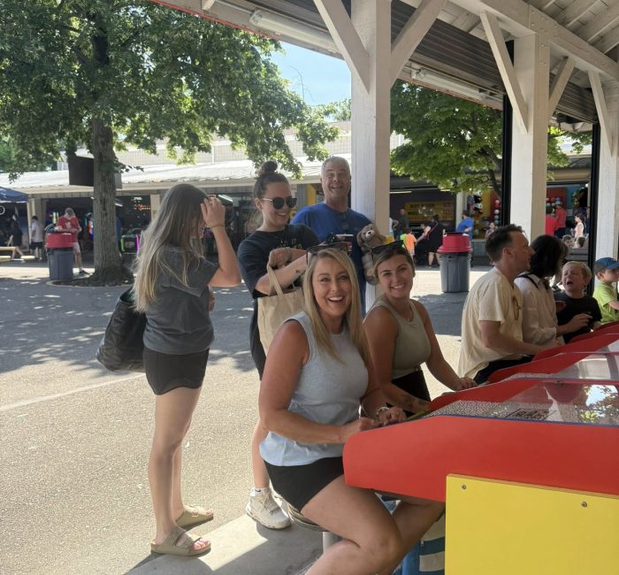 Bauer staff playing games at an amusement park