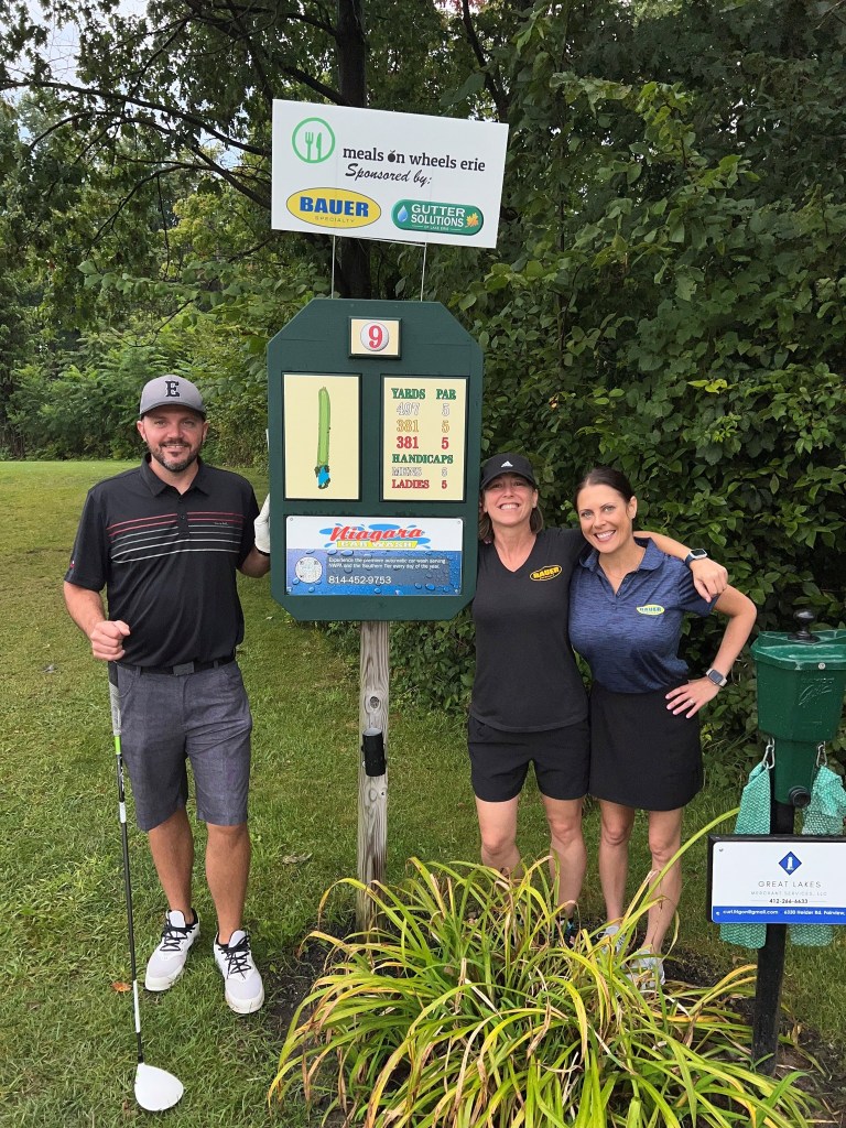 Bauer employees at golf tournament
