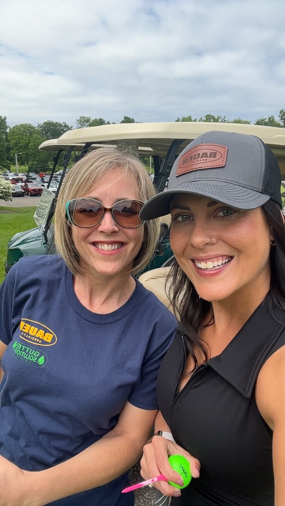 Bauer workers at a golf outing having fun