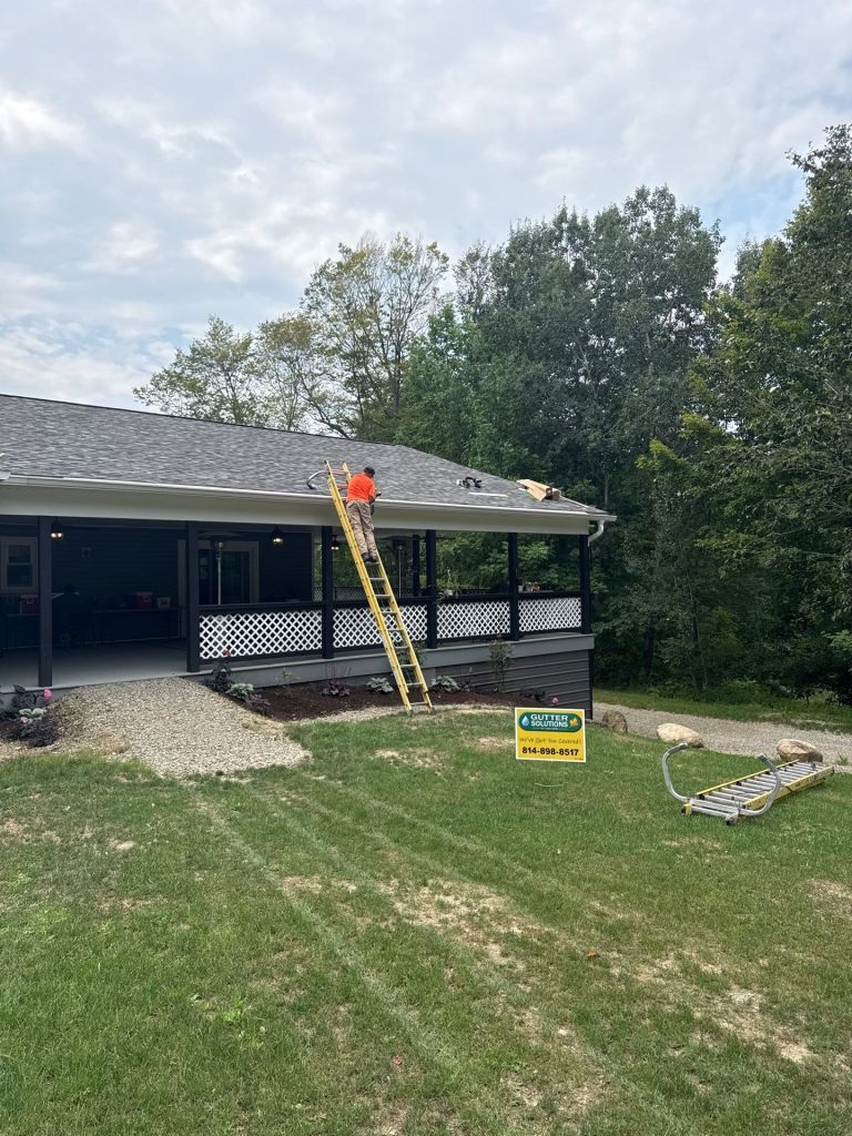 Gutter Solutions of Lake Erie yard sign in front of house. 