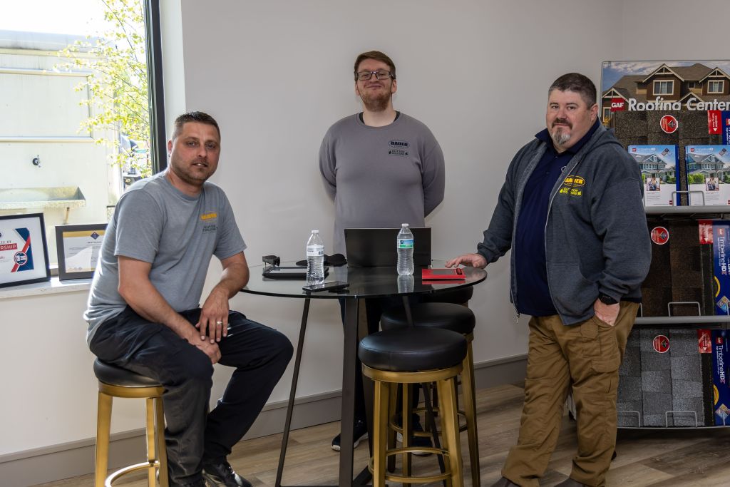 Bauer workers hanging out in showroom