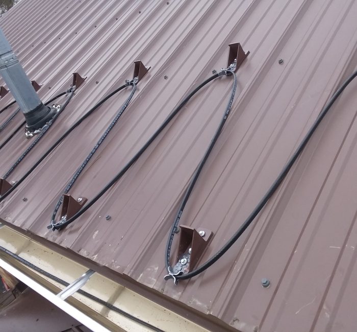 Heat cable on metal roof