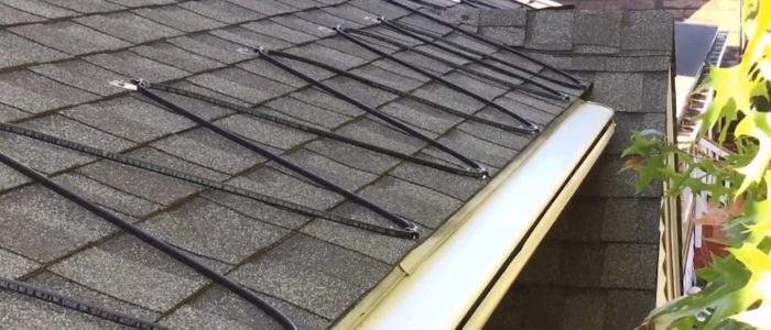 Heat cable on asphalt roof