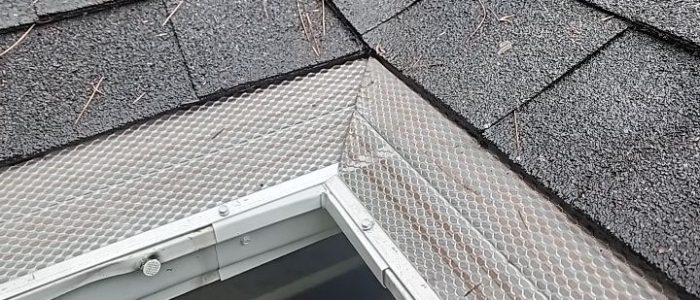 Klean Gutter corner with pine needles on roof